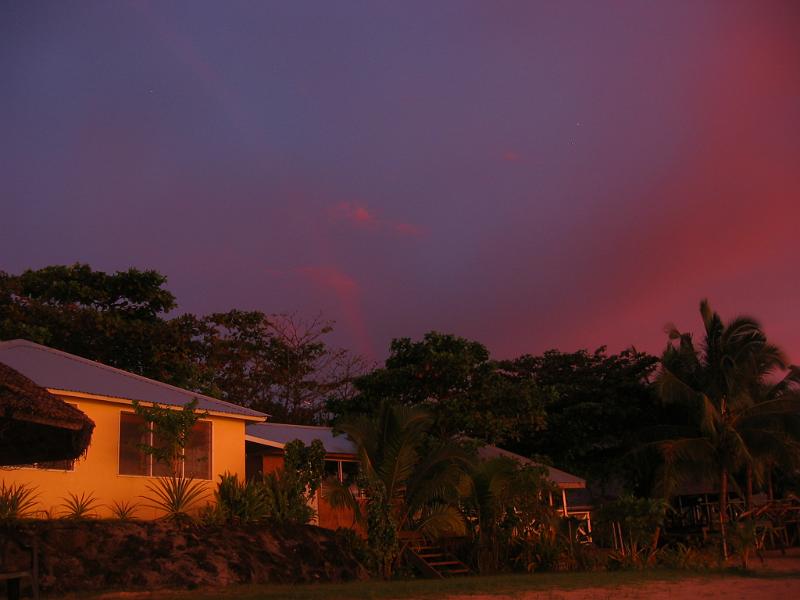 sam18 Sunset-colored clouds and a rainbow compete to decorate the sky.